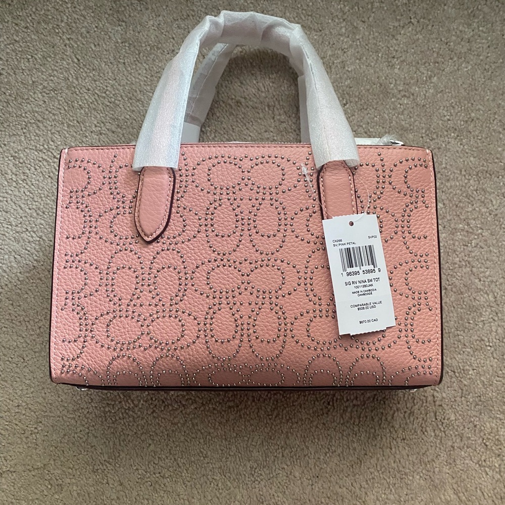 Coach Pink Satchel with Embossed Design